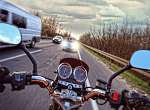 motorbike drivers point of view looking at an oncoming car seconds before an accident